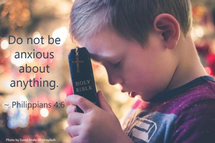 Boy with Bible and text: Do Not Be Anxious About Anything.