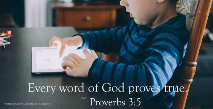 small boy using a tablet