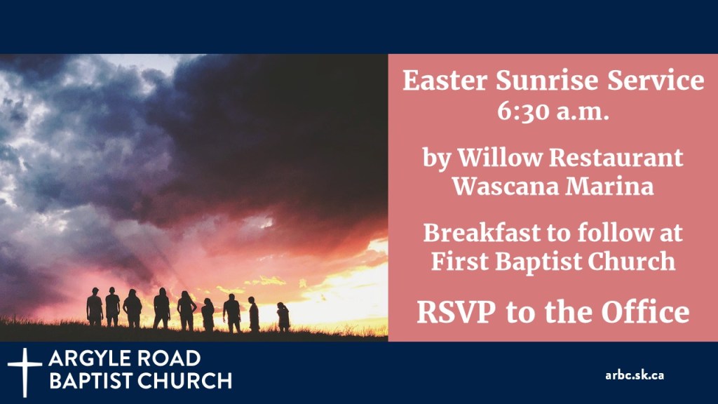 people standing silhouetted against the sunrise