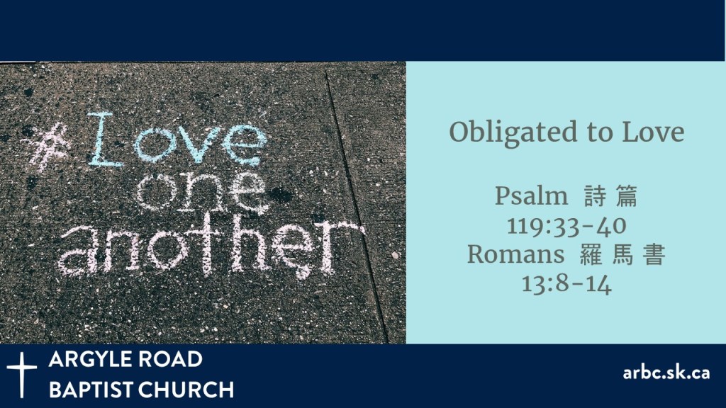 Sidewalk chalk message stating '* Love one another' with a church's logo and details about 'Obligated to Love' referencing Psalm 119:33-40 and Romans 13:8-14.